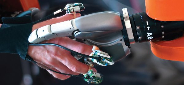 Connecting Humans and Robots through Wearable Haptics