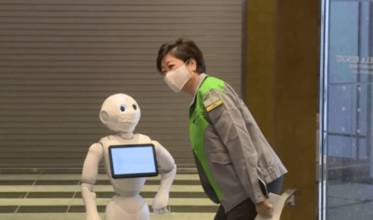 Robots are used at Tokyo Hotels to greet COVID patients